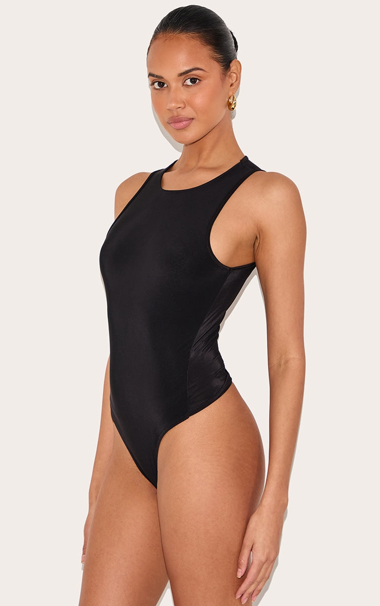 https://cdn-img.prettylittlething.com/0/d/a/0/0da0e03d5ecb4fe1dbb1e522ac6c67b1c7b54160_CNF0754_2_black_basic_slinky_racer_bodysuit.jpg