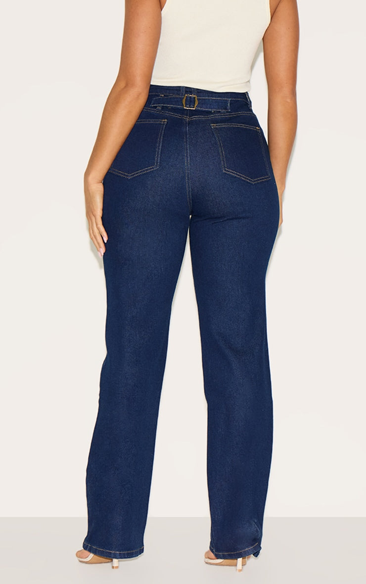 https://cdn-img.prettylittlething.com/0/e/f/5/0ef53ee4bada77bcb8c189c19ac5f8ab7bb4cc2f_CNM1000_3_shape_indigo_stretch_denim_highwaisted_pintuck_adjustable_back_detail_jeans.jpg
