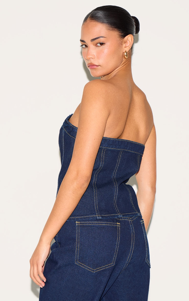 https://cdn-img.prettylittlething.com/0/f/b/5/0fb521ba5d3beecf3011c9346f412f7ed6f39743_CNL8385_2_petite_dark_indigo_contrast_seam_badeau_corset.jpg