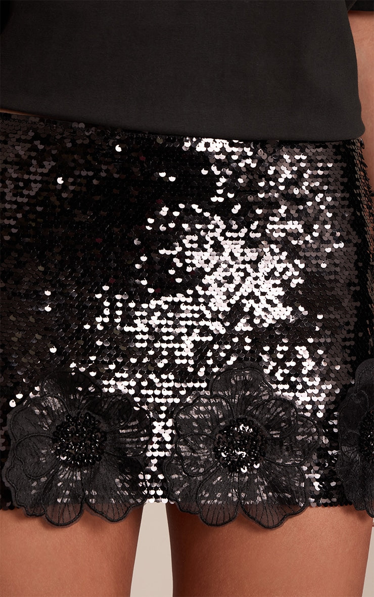https://cdn-img.prettylittlething.com/1/5/f/f/15ff3491e37d15daeebbe188ad378e8c31e7719e_cno9132_5_black_sequin_mini_skirt.jpg
