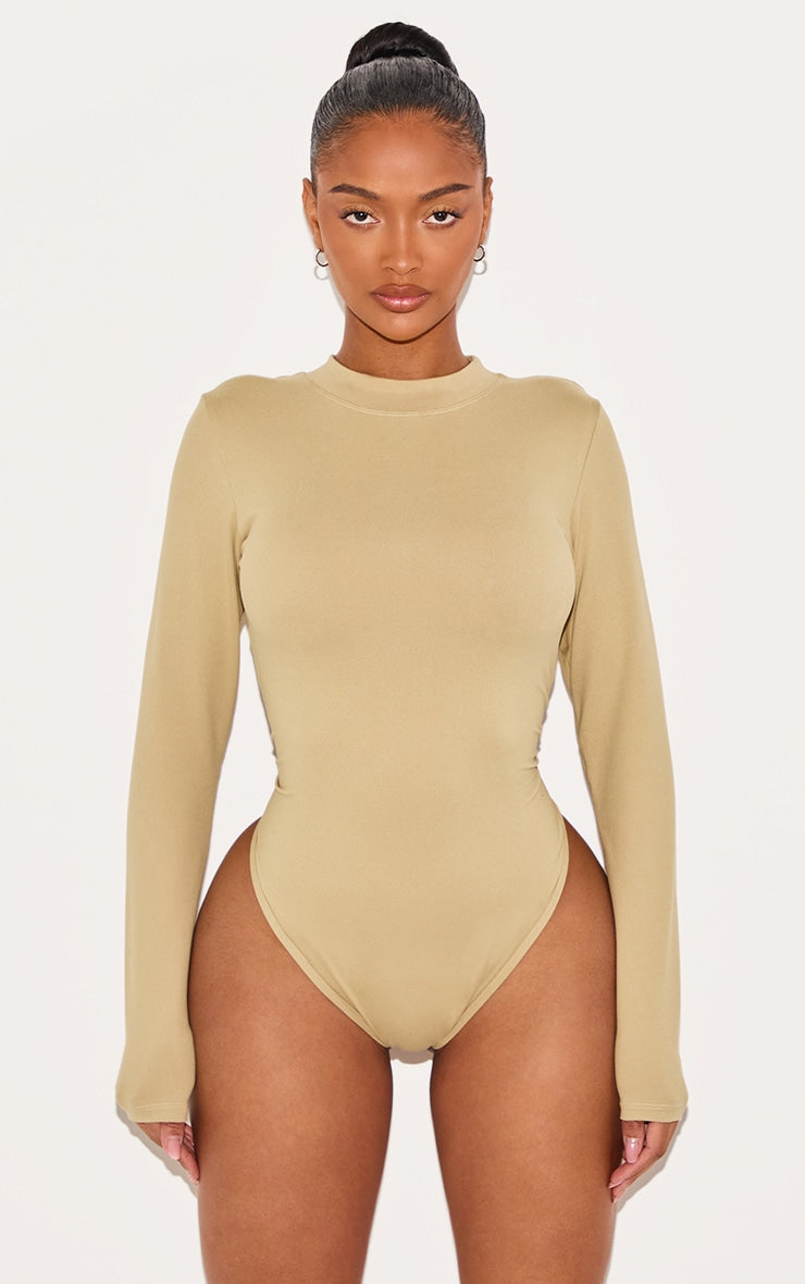 https://cdn-img.prettylittlething.com/1/d/9/3/1d93d54ba10d62fd4c702bc6ef580bf7b437f249_CNJ7645_2_shape_stone_sculpted_long_sleeve_bodysuit.jpg