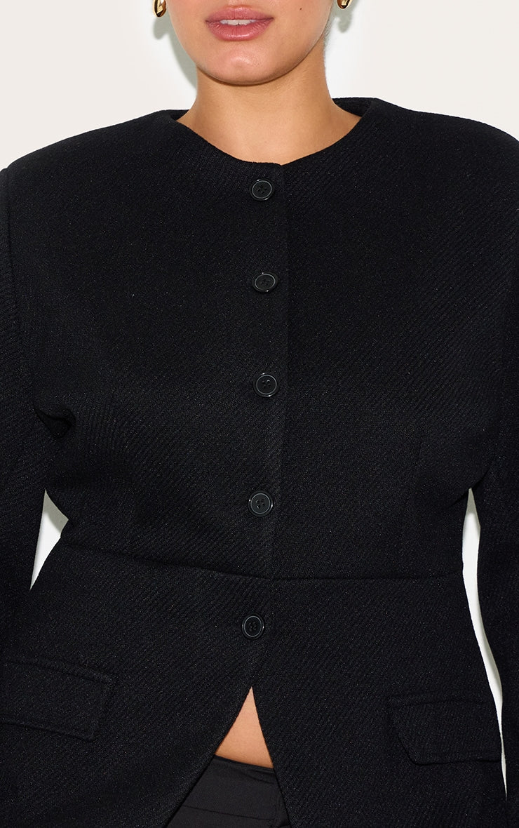 https://cdn-img.prettylittlething.com/2/0/d/2/20d2f92fc8521055b18a2e054e2d02b1388152e4_CNM5688_4_plus_black_button_up_longline_collarless_blazer.jpg