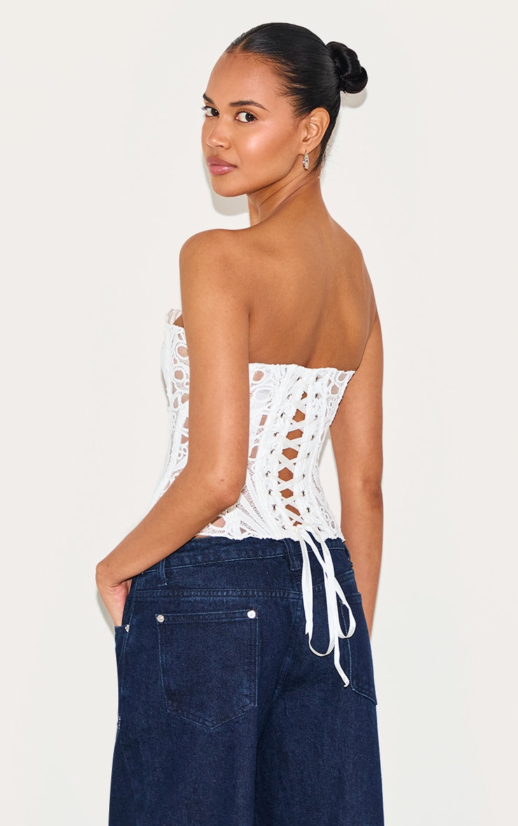 https://cdn-img.prettylittlething.com/2/8/8/e/288ee64cc009a8a99b3987fd7eccddd03421332e_CNJ4308_2_white_textured_sheer_floral_lace_corset.jpg