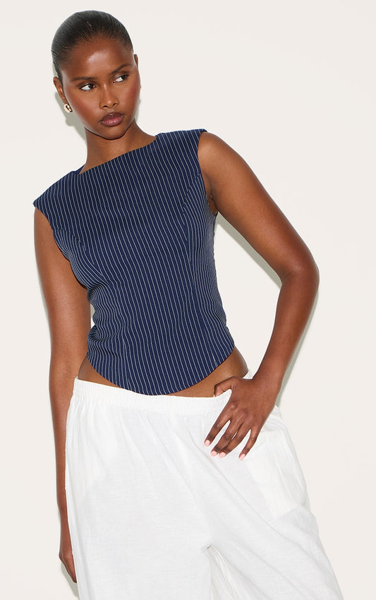 https://cdn-img.prettylittlething.com/2/a/d/b/2adb7bd193d1191abcd8b74eaa9c7c0e095d8990_CNM5327_1_navy_striped_cotton_tailored_sleeveless_top.jpg