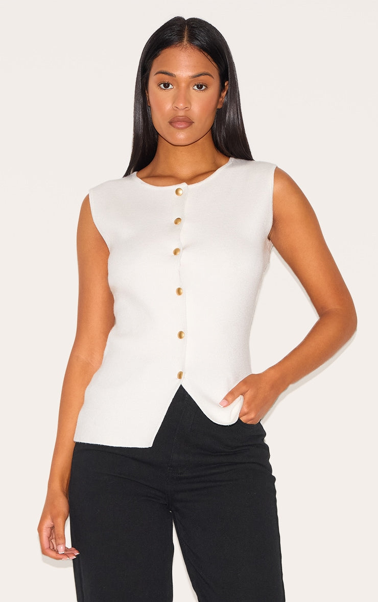 https://cdn-img.prettylittlething.com/3/0/5/9/3059436a998146aae8d5a81461be042b33e6ae18_CNM1166_1_tall_white_cinched_button_up_knit_vest_top.jpg