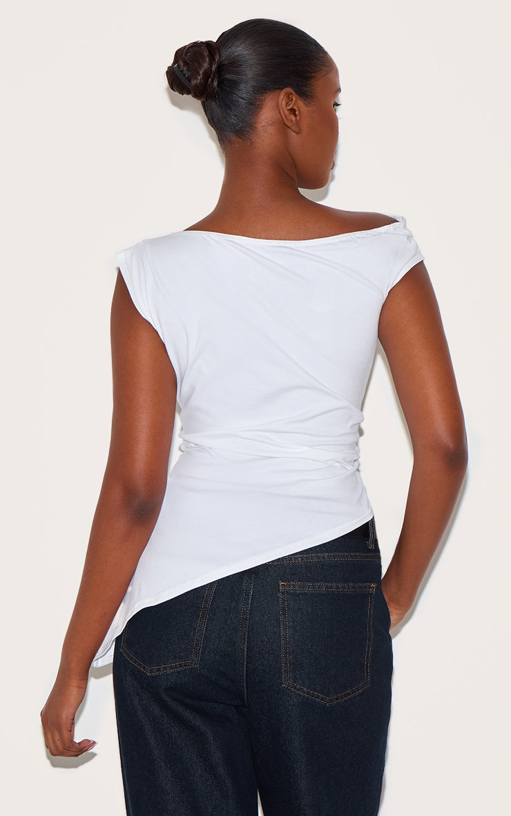 https://cdn-img.prettylittlething.com/3/2/8/d/328d93c7462f7d708adbea25f5b8cea8bca8d467_CNL8996_2_white_asymmetric_shoulder_extreme_longline_top.jpg