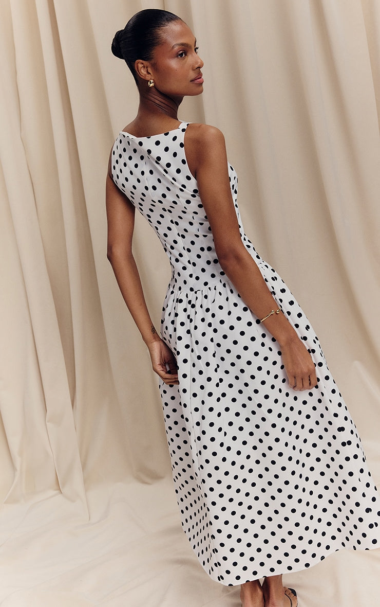 https://cdn-img.prettylittlething.com/4/e/d/2/4ed25d6df06f4d40764642fc3ab1ae2dd9e42a27_CNL8368_2_monochrome_polka_dot_printed_dropped_waist_midaxi_dress.jpg