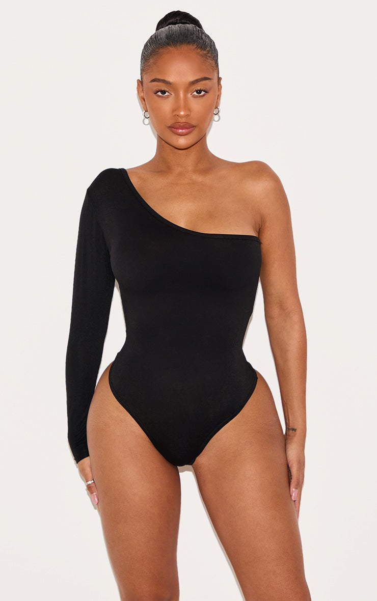 https://cdn-img.prettylittlething.com/5/a/3/0/5a30419a6502548dc7224b4f13735b24011184cb_CME0529_2_shape_black_jersey_one_shoulder_bodysuit.jpg