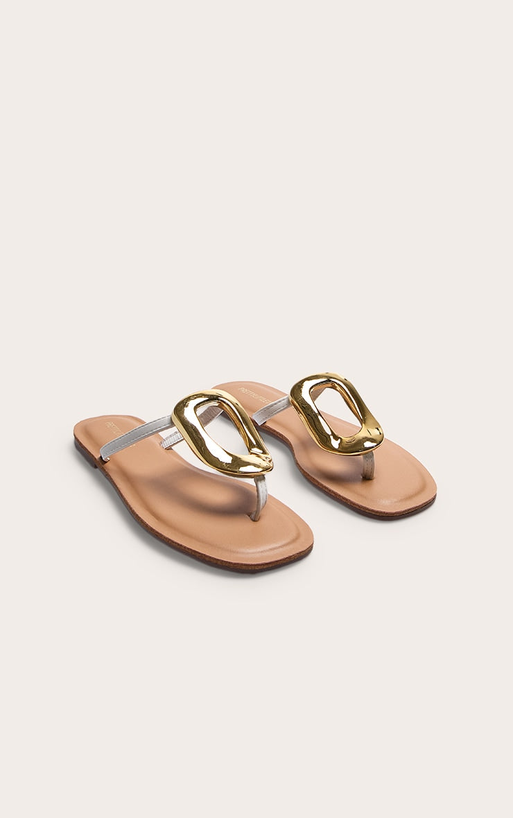https://cdn-img.prettylittlething.com/5/b/c/4/5bc4a9ff4e9d27bc23ca3f239b573b6a6b1de83a_CNL8151_1_white_pu_square_toe_thong_trim_detail_resin_sole_flat_sandals.jpg