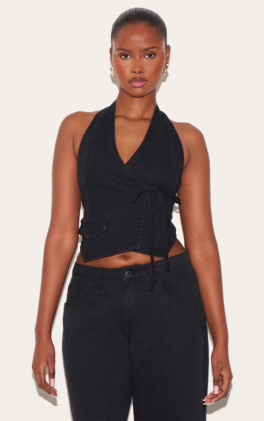 https://cdn-img.prettylittlething.com/5/e/c/0/5ec0065c5d2f3947a29595f496ec239d8ad7889a_CNL7964_1_washed_black_halter_neck_wrap_front_denim_waistcoat.jpg