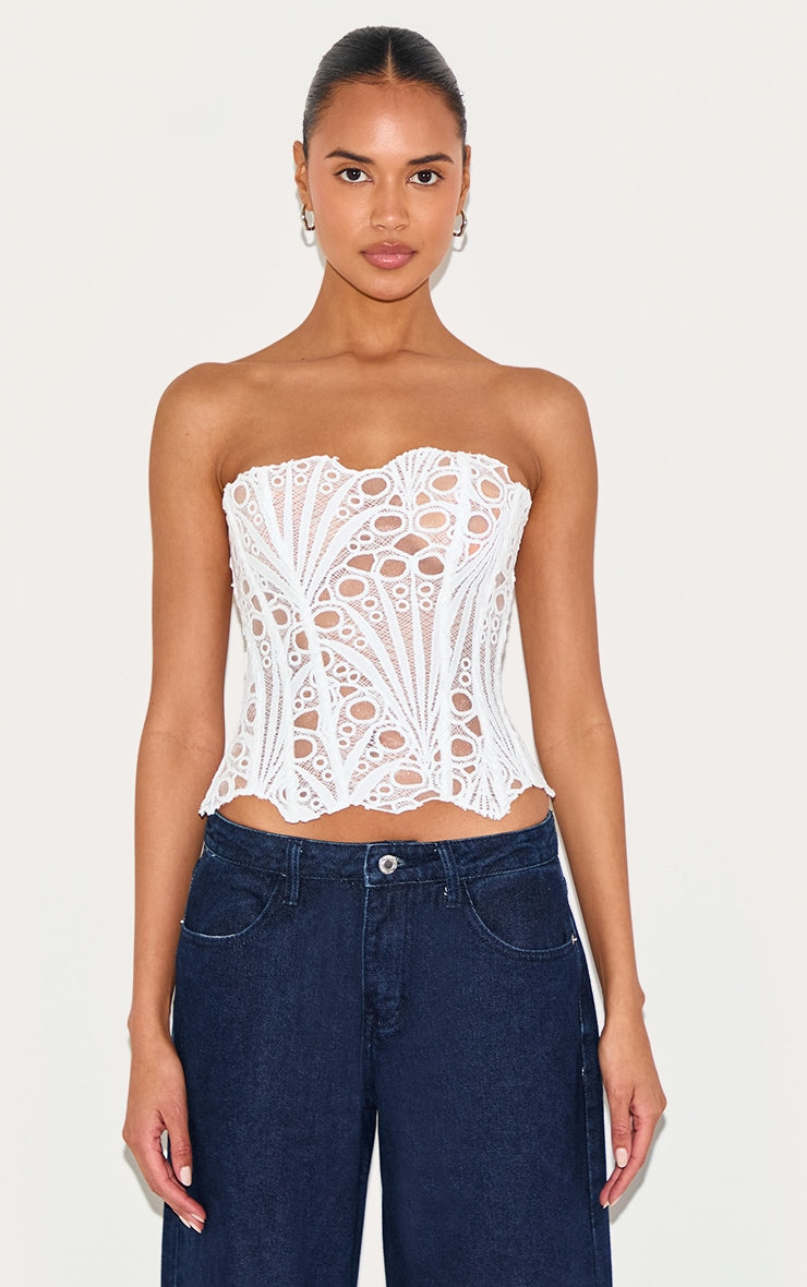 https://cdn-img.prettylittlething.com/6/2/1/c/621c886584439f634cfbd538ca5710efbe92d8ef_CNJ4308_1_white_textured_sheer_floral_lace_corset.jpg