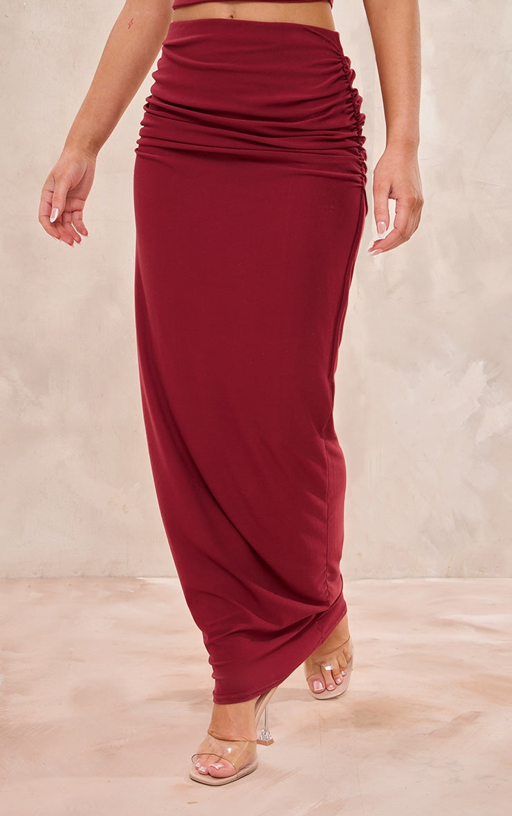 https://cdn-img.prettylittlething.com/6/c/e/7/6ce72d8ac7a9c500a64368e12853ebe15745dba0_CNI4956_2_burgundy_soft_touch_ruched_back_maxi_skirt.jpg