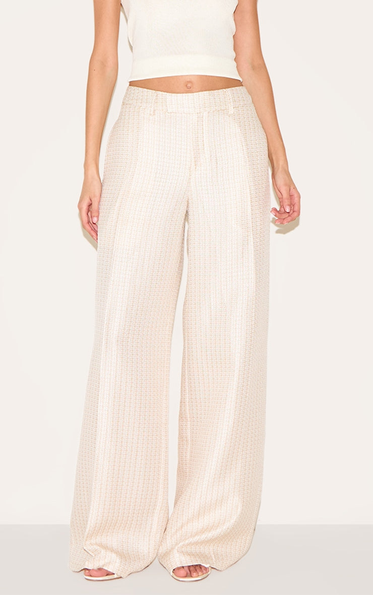 https://cdn-img.prettylittlething.com/7/b/c/e/7bce2ab49ee8e0a3f079bc551e3b21d940b96ad1_CNL9195_2_cream_textured_woven_tailored_trousers.jpg