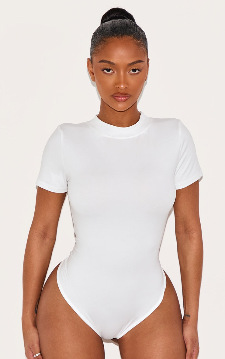 https://cdn-img.prettylittlething.com/8/2/4/4/8244fb0ed2370d0a90541f4880dac3311dcc42fd_CNJ7652_2_shape_white_sculpted_short_sleeve_bodysuit.jpg