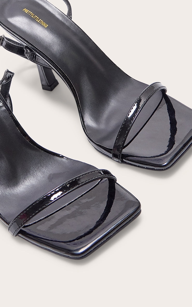 https://cdn-img.prettylittlething.com/8/a/6/b/8a6b9ab5aaa55c2bc817c90fe6f26562c0642e68_CMZ5960_4_black_pu_square_toe_barely_there_mid_heeled_sandals.jpg