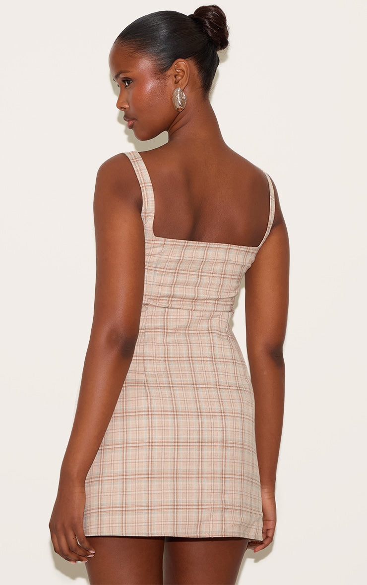 https://cdn-img.prettylittlething.com/9/1/c/9/91c916bc152c01305233372587df2e8ca97e33ac_CNM2511_2_beige_multi_checked_bodice_a_line_dress.jpg