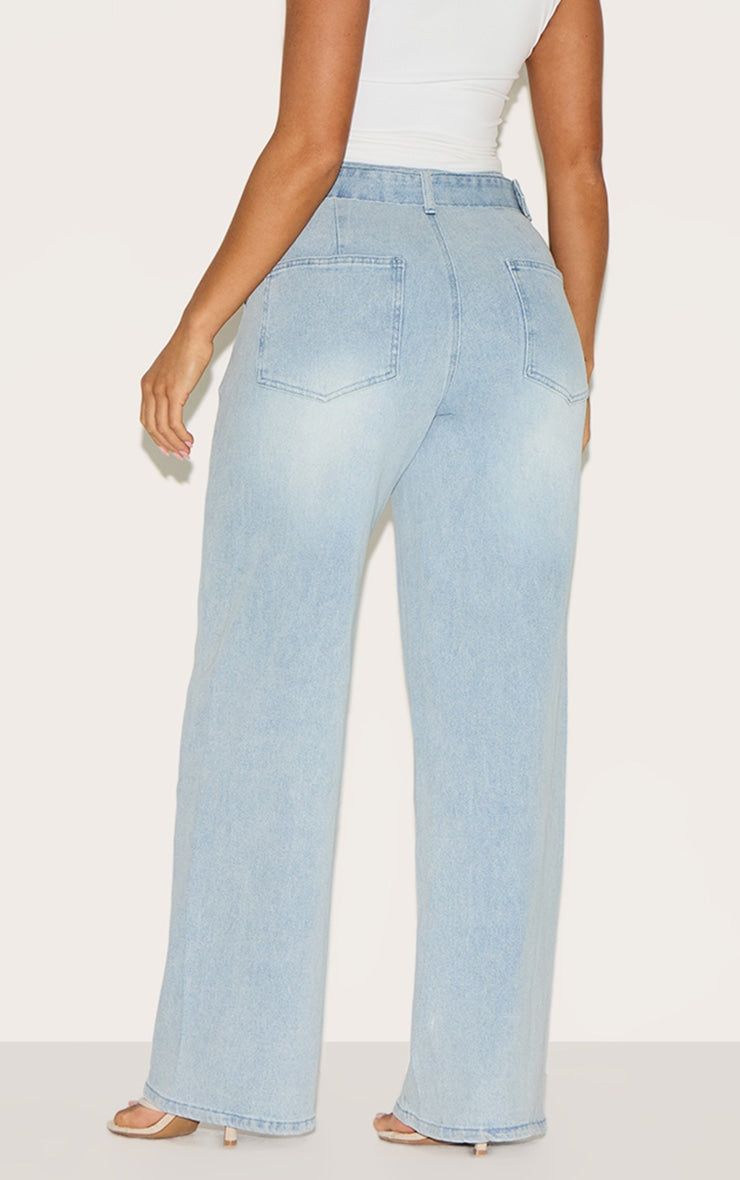 https://cdn-img.prettylittlething.com/9/a/1/2/9a1239c584fabd97a3b78d0da18f31f0631c8531_CNM1002_3_shape_light_blue_stretch_denim_highwaisted_belted_wide_leg_jeans.jpg