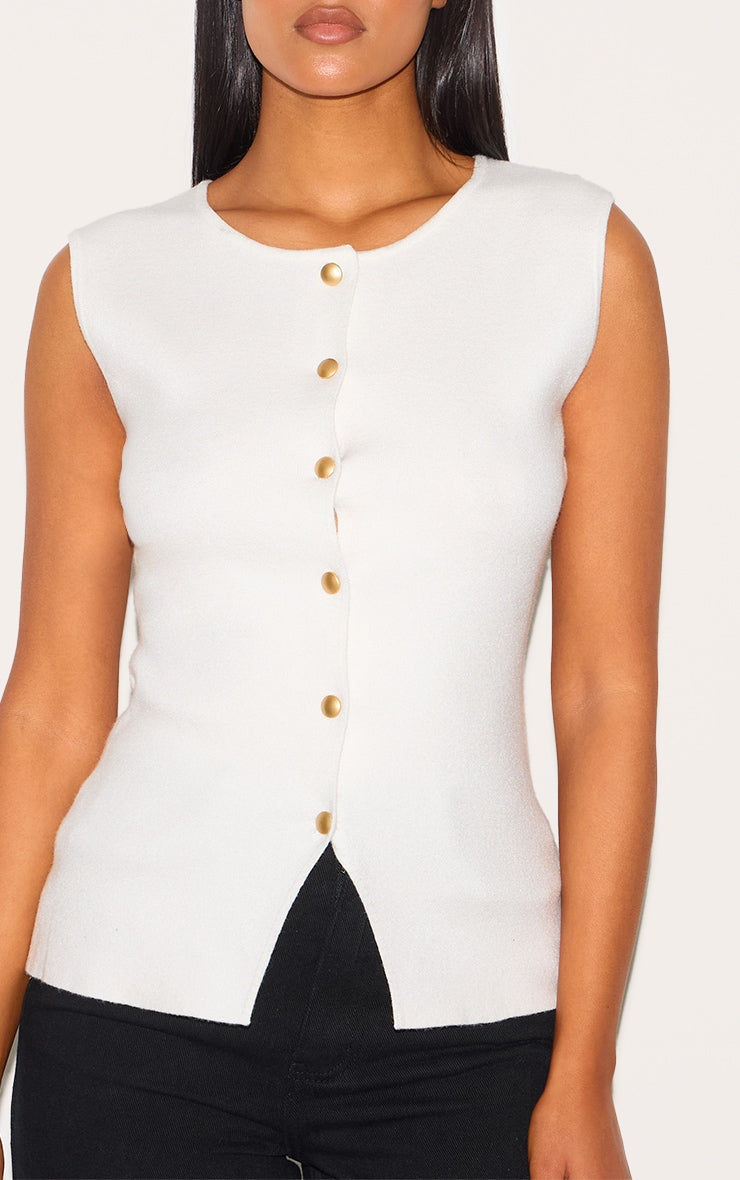 https://cdn-img.prettylittlething.com/a/6/4/4/a644e4244fc7b957ab2f700a66f241fc9160db6e_CNM1166_4_tall_white_cinched_button_up_knit_vest_top.jpg