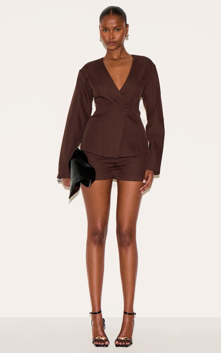 https://cdn-img.prettylittlething.com/a/6/5/f/a65f5f5e8306a8f9948859e29a97a0c2628d5a17_CNM1822_3_deep_chocolate_tailored_cinched_waist_asymmetric_blazer.jpg