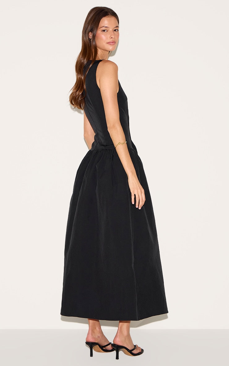 https://cdn-img.prettylittlething.com/e/8/c/c/e8ccdd4f87aa73ee4e3aae38f6abba6482f4c8cd_CNM6729_2_black_dropped_waist_midaxi_dress.jpg
