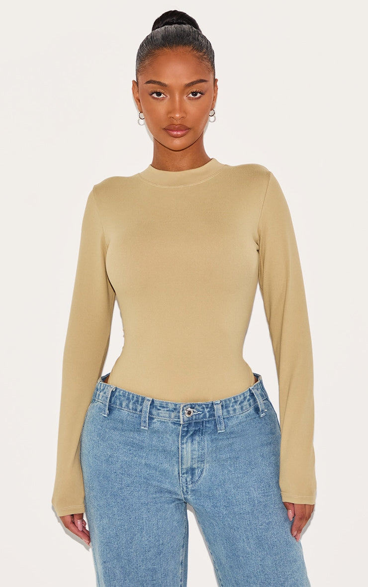https://cdn-img.prettylittlething.com/e/b/1/a/eb1a05a5e8c8cef24ddcc699a6cc37b07f00a260_CNJ7645_1_shape_stone_sculpted_long_sleeve_bodysuit.jpg