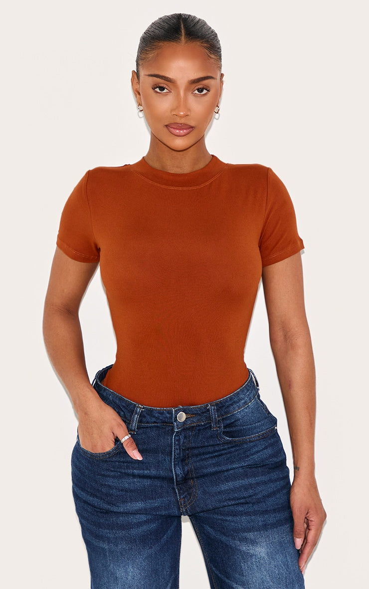 https://cdn-img.prettylittlething.com/f/8/8/0/f880a2b0f336d6edee44514ac581ad527d35089e_CNL9492_1_shape_rust_sculpted_short_sleeve_bodysuit.jpg