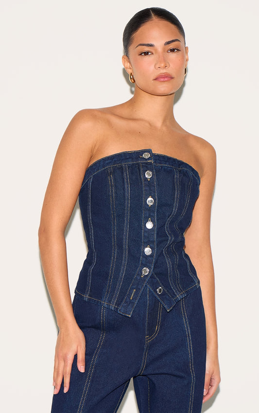 https://cdn-img.prettylittlething.com/f/c/e/1/fce118ad5968adf4eec08a9909b73f98a8a1aec5_CNL8385_1_petite_dark_indigo_contrast_seam_badeau_corset.jpg
